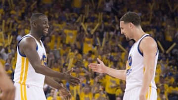 May 1, 2016; Oakland, CA, USA; Golden State Warriors forward Draymond Green (23) celebrates with guard Klay Thompson (11) during the third quarter in game one of the second round of the NBA Playoffs against the Portland Trail Blazers at Oracle Arena. The Warriors defeated the Trail Blazers 118-106. Mandatory Credit: Kyle Terada-USA TODAY Sports