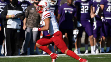 Nov 7, 2020; Evanston, Illinois, USA; Nebraska Cornhuskers quarterback Adrian Martinez (2) runs against the Northwestern Wildcats during the first half at Ryan Field. Mandatory Credit: David Banks-USA TODAY Sports