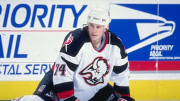 9 Mar 1999: Jay McKee #74 of the Buffalo Sabres stretching during warm ups before the game against the Edmonton Oilers at the Marine Midland Arena in Buffalo, New York. The Oilers defeated the Sabres 5-3. Mandatory Credit: Rick Stewart /Allsport