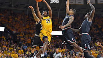 WICHITA, KS - MARCH 04: Markis McDuffie #32 of the Wichita State Shockers drives to the basket against Jacob Evans #1 of the Cincinnati Bearcats during the first half on March 4, 2018 at Charles Koch Arena in Wichita, Kansas. (Photo by Peter Aiken/Getty Images)