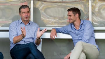 Michael Zorc and Sebastian Kehl of Borussia Dortmund (Photo by TF-Images/Getty Images)
