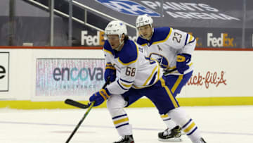 May 8, 2021; Pittsburgh, Pennsylvania, USA; Buffalo Sabres right wing Victor Olofsson (68) carries the puck alongside center Sam Reinhart (23) against the Pittsburgh Penguins during the first period at PPG Paints Arena. Mandatory Credit: Charles LeClaire-USA TODAY Sports