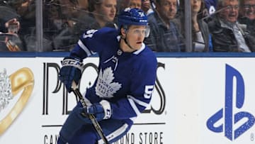 Jake Gardiner #51 of the Toronto Maple Leafs turns with the puck against the Winnipeg Jets during an NHL game at the Air Canada Centre on March 31, 2018 in Toronto, Ontario, Canada. The Jets defeated the Maple Leafs 3-1. (Photo by Claus Andersen/Getty Images) *** Local Caption *** Jake Gardiner