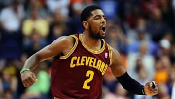 Mar 12, 2014; Phoenix, AZ, USA; Cleveland Cavaliers guard Kyrie Irving (2) reacts on the court against the Phoenix Suns in the second half at US Airways Center. The Cavaliers won 110-101. Mandatory Credit: Jennifer Stewart-USA TODAY Sports