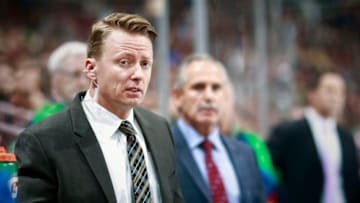 VANCOUVER, BC - FEBRUARY 15: Assistant coach Glen Gulutzan of the Vancouver Canucks looks on from the bench during their NHL game against the Minnesota Wild at Rogers Arena February 15, 2016 in Vancouver, British Columbia, Canada. (Photo by Jeff Vinnick/NHLI via Getty Images)