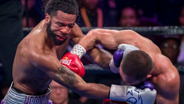 OXON HILL, MD - MARCH 24: Sergey Lipinets (R) trades punches with Lamont Peterson during the seventh round of their welterweight fight at The Theater at MGM National Harbor on March 24, 2019 in Oxon Hill, Maryland. (Photo by Scott Taetsch/Getty Images)