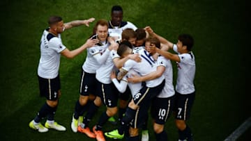 LONDON, ENGLAND - APRIL 30: Dele Alli of Tottenham Hotspur celebrates scoring his sides first goal with his Tottenham Hotspur team mates during the Premier League match between Tottenham Hotspur and Arsenal at White Hart Lane on April 30, 2017 in London, England. (Photo by Dan Mullan/Getty Images)