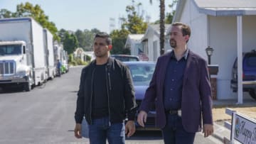 "Going Mobile" -- After the body of a Marine Lieutenant is found hidden under an 18-wheeler, the NCIS team tracks the vehicle's previous locations to pinpoint the crime scene and suspect. Also, Sloane encourages the team to sit down and talk about Ziva's recent reappearance, on NCIS, Tuesday, Oct. 8 (8:00-9:00 PM, ET/PT) on the CBS Television Network. Pictured: Wilmer Valderrama as NCIS Special Agent Nicholas "Nick" Torres, Sean Murray as NCIS Special Agent Timothy McGee. Photo: Sonja Flemming/CBS ©2019 CBS Broadcasting, Inc. All Rights Reserved