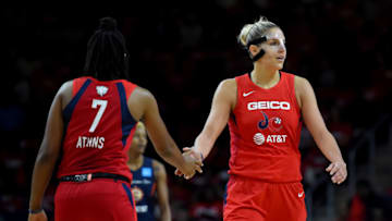 WASHINGTON, DC - SEPTEMBER 29: Elena Delle Donne #11 of the Washington Mystics celebrates with Ariel Atkins #7 after a play against the Connecticut Sun during the first half of WNBA Finals Game One at St Elizabeths East Entertainment & Sports Arena on September 29, 2019 in Washington, DC. NOTE TO USER: User expressly acknowledges and agrees that, by downloading and or using this photograph, User is consenting to the terms and conditions of the Getty Images License Agreement. (Photo by Will Newton/Getty Images)