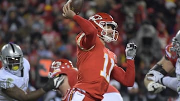 Dec 8, 2016; Kansas City, MO, USA; Kansas City Chiefs quarterback Alex Smith (11) throws a pass against the Oakland Raiders during a NFL football game at Arrowhead Stadium. The Chiefs defeated the Raiders 21-13. Mandatory Credit: Kirby Lee-USA TODAY Sports