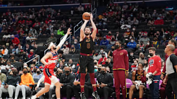 WASHINGTON, DC - DECEMBER 30: Kevin Love #0 of the Cleveland Cavaliers takes a jump shot over Jordan Schakel #20 of the Washington Wizards in the second quarter at the Capital One Arena on December 30, 2021 in Washington, DC. (Photo by Mitchell Layton/Getty Images)