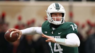 EAST LANSING, MI - NOVEMBER 10: Brian Lewerke #14 of the Michigan State Spartans throws a first half pass while playing the Ohio State Buckeyes at Spartan Stadium on November 10, 2018 in East Lansing, Michigan. (Photo by Gregory Shamus/Getty Images)
