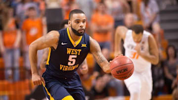 Feb 27, 2016; Stillwater, OK, USA; West Virginia Mountaineers guard Jaysean Paige (5) dribbles against the Oklahoma State Cowboys during the first half at Gallagher-Iba Arena. Mandatory Credit: Rob Ferguson-USA TODAY Sports