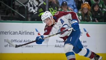 Nov 21, 2022; Dallas, Texas, USA; Colorado Avalanche defenseman Cale Makar (8) shoots the puck in the Dallas Stars zone during the first period at the American Airlines Center. Mandatory Credit: Jerome Miron-USA TODAY Sports