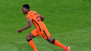 AMSTERDAM, NETHERLANDS - JUNE 13: Denzel Dumfries of the Netherlands celebrates after scoring his sides third goal during the UEFA Euro 2020 Championship Group C match between Netherlands and Ukraine at Johan Cruijff ArenA on June 13, 2021 in Amsterdam, Netherlands (Photo by Andre Weening/BSR Agency/Getty Images)