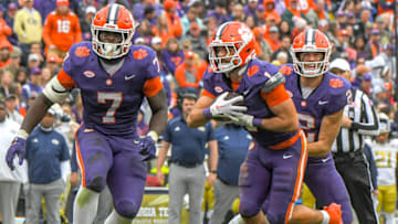 Nov 11, 2023; Clemson, South Carolina, USA; Clemson running back Will Shipley (1) takes a handoff from quarterback Cade Klubnik (2) behind running back Phil Mafah (7) against the Georgia Tech Yellow Jackets during the third quarter at Memorial Stadium. Mandatory Credit: Ken Ruinard-USA TODAY Sports