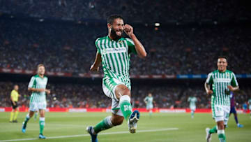 BARCELONA, SPAIN - AUGUST 25: Nabil Fekir of Real Betis celebrates scoring his team's opening goal with team mates during the Liga match between FC Barcelona and Real Betis Balompie at Camp Nou on August 25, 2019 in Barcelona, Spain. (Photo by Quality Sport Images/Getty Images)