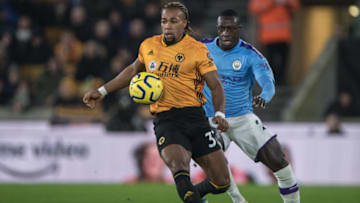 WOLVERHAMPTON, ENGLAND - DECEMBER 27: Benjamin Mendy of Manchester City and Adama Traore of Wolverhampton Wanderers during the Premier League match between Wolverhampton Wanderers and Manchester City at Molineux on December 27, 2019 in Wolverhampton, United Kingdom. (Photo by Sebastian Frej/MB Media/Getty Images)