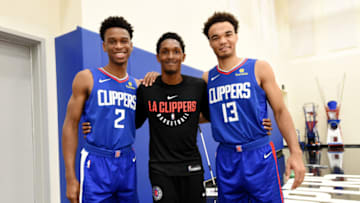PLAYA VISTA, CA - JUNE 25: Draft Picks Shai Gilgeous-Alexander and Jerome Robinson pose for a photo with Lou Williams #23 of the LA Clippers during the Draft Press Conference at the Clippers Training Facility in Playa Vista, California on June 25, 2018 at Clippers Training Facility. NOTE TO USER: User expressly acknowledges and agrees that, by downloading and or using this photograph, User is consenting to the terms and conditions of the Getty Images License Agreement. Mandatory Copyright Notice: Copyright 2018 NBAE (Photo by Andrew D. Bernstein/NBAE via Getty Images)