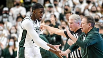 Michigan State's Gabe Brown, left, celebrates with head coach Tom Izzo during the first half in the game against Northwestern on Saturday, Jan. 15, 2022, at the Breslin Center in East Lansing.220115 Msu Northwestern 061a