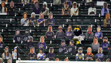 Nov 4, 2020; Carson, California, USA; LA Galaxy mascot Cosmo sits in the bleachers among the fan cut outs during the first half against the Seattle Sounders at Dignity Health Sports Park. Mandatory Credit: Kirby Lee-USA TODAY Sports