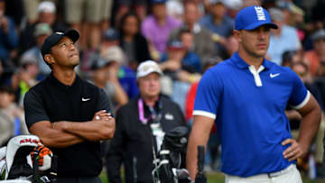 FARMINGDALE, NEW YORK - MAY 17: Tiger Woods of the United States and Brooks Koepka of the United States prepare to tee off on the 17th hole during the second round of the 2019 PGA Championship at the Bethpage Black course on May 17, 2019 in Farmingdale, New York. (Photo by Stuart Franklin/Getty Images)