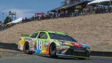 Jun 28, 2015; Sonoma, CA, USA; Sprint Cup Series driver Kyle Busch (18) drives during the Toyota/SaveMart 350 at Sonoma Raceway. Mandatory Credit: Ed Szczepanski-USA TODAY Sports