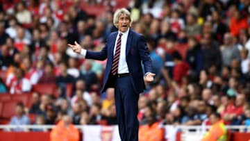 LONDON, ENGLAND - AUGUST 25: Manuel Pellegrini, Manager of West Ham United reacts during the Premier League match between Arsenal FC and West Ham United at Emirates Stadium on August 25, 2018 in London, United Kingdom. (Photo by Clive Mason/Getty Images)