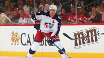 NEWARK, NJ - DECEMBER 08: Jack Johnson #7 of the Columbus Blue Jackets plays the puck during the game against the New Jersey Devils at Prudential Center on December 8, 2017 in Newark, New Jersey. (Photo by Andy Marlin/NHLI via Getty Images) *** Local Caption *** Jack Johnson