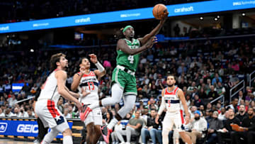 WASHINGTON, DC - OCTOBER 30: Jrue Holiday #4 of the Boston Celtics drives to the hoop in the first quarter against the Washington Wizards at Capital One Arena on October 30, 2023 in Washington, DC. NOTE TO USER: User expressly acknowledges and agrees that, by downloading and or using this photograph, User is consenting to the terms and conditions of the Getty Images License Agreement. (Photo by Greg Fiume/Getty Images)