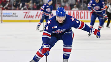 LAVAL, QC - APRIL 08: Jimmy Schuldt #4 of the Rochester Americans skates against the Laval Rocket during the second period at Place Bell on April 8, 2022 in Laval, Canada. The Laval Rocket defeated the Rochester Americans 4-3 in overtime. (Photo by Minas Panagiotakis/Getty Images)