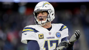 FOXBOROUGH, MASSACHUSETTS - JANUARY 13: Philip Rivers #17 of the Los Angeles Chargers reacts during the fourth quarter in the AFC Divisional Playoff Game against the New England Patriots at Gillette Stadium on January 13, 2019 in Foxborough, Massachusetts. (Photo by Elsa/Getty Images)