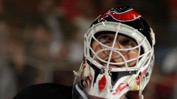 NEWARK, NJ - APRIL 11: Martin Brodeur #30 of the New Jersey Devils takes a break during the third period against the New York Islanders at the Prudential Center on April 11, 2014 in Newark, New Jersey. The Islanders defeated the Devils 3-2 in the shootout. (Photo by Bruce Bennett/Getty Images)