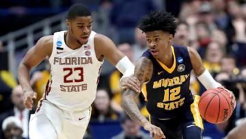 HARTFORD, CONNECTICUT - MARCH 23: Ja Morant #12 of the Murray State Racers is defended by M.J. Walker #23 of the Florida State Seminoles in the first half during the second round of the 2019 NCAA Men's Basketball Tournament at XL Center on March 23, 2019 in Hartford, Connecticut. (Photo by Rob Carr/Getty Images)