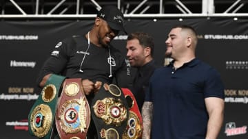 NEW YORK, NEW YORK - MAY 30: Anthony Joshua of the United Kingdom holds his belts while talking with Andy Ruiz of Mexico during the press conference prior to their world heavyweight title fight at the Beacon Theatre on May 30, 2019 in New York City. (Photo by Sarah Stier/Getty Images)