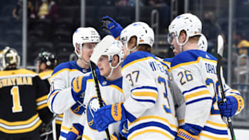 May 1, 2021; Boston, Massachusetts, USA; Buffalo Sabres center Arttu Ruotsalainen (25) is congratulated by his teammates after scoring a goal during the third period against the Boston Bruins at TD Garden. Mandatory Credit: Bob DeChiara-USA TODAY Sports