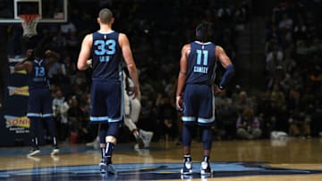 MEMPHIS, TN - NOVEMBER 16: Marc Gasol #33 and Mike Conley #11 of the Memphis Grizzlies looks on against the Sacramento Kings on November 16, 2018 at FedExForum in Memphis, Tennessee. NOTE TO USER: User expressly acknowledges and agrees that, by downloading and or using this photograph, User is consenting to the terms and conditions of the Getty Images License Agreement. Mandatory Copyright Notice: Copyright 2018 NBAE (Photo by Joe Murphy/NBAE via Getty Images)
