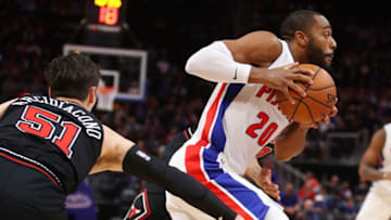 DETROIT, MICHIGAN - MARCH 10: Wayne Ellington #20 of the Detroit Pistons drives past Ryan Arcidiacono #51 of the Chicago Bulls during the first half at Little Caesars Arena on March 10, 2019 in Detroit, Michigan. NOTE TO USER: User expressly acknowledges and agrees that, by downloading and or using this photograph, User is consenting to the terms and conditions of the Getty Images License Agreement. (Photo by Gregory Shamus/Getty Images)