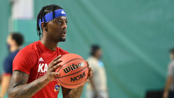 FORT MYERS, FLORIDA - NOVEMBER 26: Marcus Garrett #0 of the Kansas Jayhawks warms up prior to the game against the Gonzaga Bulldogs during the Rocket Mortgage Fort Myers Tip-Off at Suncoast Credit Union Arena on November 26, 2020 in Fort Myers, Florida. (Photo by Douglas P. DeFelice/Getty Images)