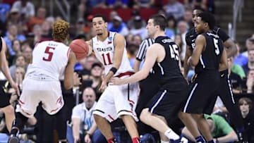 Mar 17, 2016; Raleigh, NC, USA; Texas Tech Red Raiders forward Zach Smith (11) passes the ball to forward Justin Gray (5) in front of Butler Bulldogs forward Andrew Chrabascz (45) during the second half at PNC Arena. Mandatory Credit: Bob Donnan-USA TODAY Sports