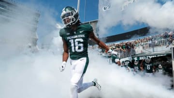 Michigan State wide receiver Christian Fitzpatrick (16) runs out of the tunnel for the Youngstown State game at Spartan Stadium in East Lansing on Saturday, Sept. 11, 2021.