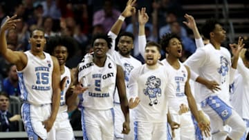 CHARLOTTE, NORTH CAROLINA - MARCH 14: The North Carolina Tar Heels bench reacts to a three pointer against the Louisville Cardinals during their game in the quarterfinal round of the 2019 Men's ACC Basketball Tournament at Spectrum Center on March 14, 2019 in Charlotte, North Carolina. (Photo by Streeter Lecka/Getty Images)