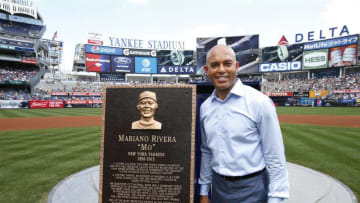 NEW YORK, NY - AUGUST 14: Mariano Rivera poses with his plaque before a game between the Tampa Bay Rays and the New York Yankees at Yankee Stadium on August 14, in the Bronx borough of New York City. (Photo by Rich Schultz/Getty Images)