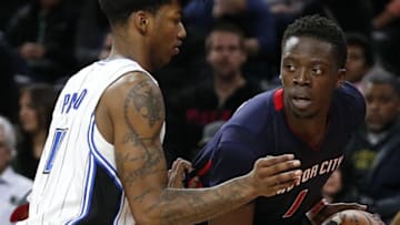 Dec 4, 2016; Auburn Hills, MI, USA; Detroit Pistons guard Reggie Jackson (1) gets defended by Orlando Magic guard Elfrid Payton (4) during the fourth quarter at The Palace of Auburn Hills. Magic win 98-92. Mandatory Credit: Raj Mehta-USA TODAY Sports