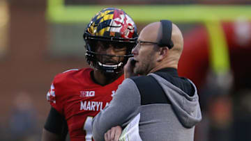 COLLEGE PARK, MD - OCTOBER 27: Interim head coach Matt Canada of the Maryland Terrapins speaks to Kasim Hill #11 of the Maryland Terrapins during the second half against the Illinois Fighting Illini at Capital One Field on October 27, 2018 in College Park, Maryland. (Photo by Will Newton/Getty Images)