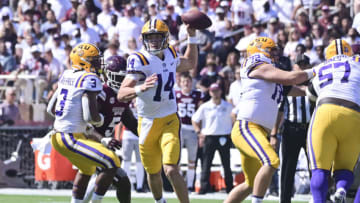 Sep 25, 2021; Starkville, Mississippi, USA; LSU Tigers quarterback Max Johnson (14) moves in the pocket against the Mississippi State Bulldogs during the first quarter at Davis Wade Stadium at Scott Field. Mandatory Credit: Matt Bush-USA TODAY Sports