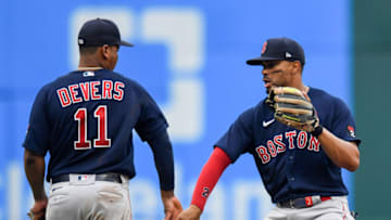 Rafael Devers #11 and Xander Bogaerts #2 of the Boston Red Sox (Photo by Nick Cammett/Getty Images)