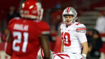 PISCATAWAY, NJ - SEPTEMBER 30: Quarterback Joe Burrow #10 of the Ohio State Buckeyes calls out signals (Photo by Hunter Martin/Getty Images)