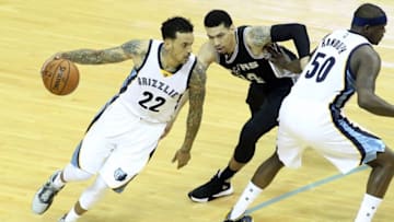 Apr 22, 2016; Memphis, TN, USA; Memphis Grizzlies forward Matt Barnes (22) drives against San Antonio Spurs guard Danny Green (14) in game three of the first round of the NBA Playoffs at FedExForum. Mandatory Credit: Nelson Chenault-USA TODAY Sports