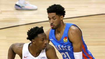 Saben Lee #38 of the Detroit Pistons drives against Aaron Wiggins #21 of the Oklahoma City Thunder during the 2021 NBA Summer League at the Thomas & Mack Center on August 8, 2021 in Las Vegas, Nevada. The Thunder defeated the Pistons 76-72. NOTE TO USER: User expressly acknowledges and agrees that, by downloading and or using this photograph, User is consenting to the terms and conditions of the Getty Images License Agreement. (Photo by Ethan Miller/Getty Images)